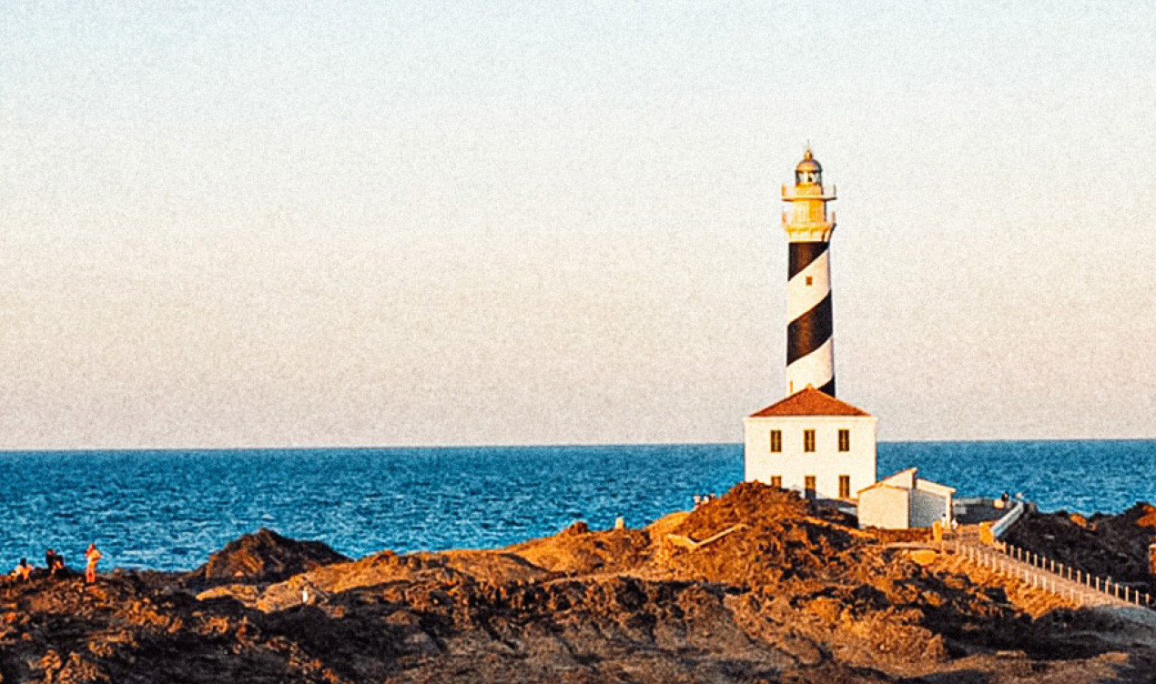 Farvàritx lighthouse during sunset.